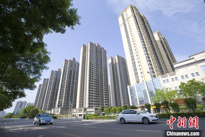 資料圖：車輛從一樓盤前經(jīng)過(guò)。 <a target='_blank' href='/'><p  align=